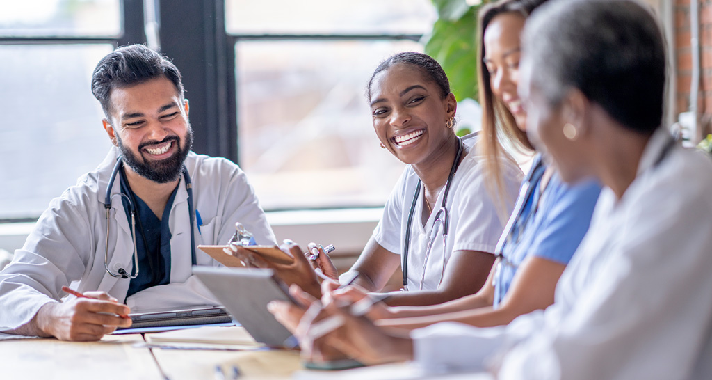 A group of doctors in a conference room